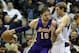 Los Angeles Lakers' Pau Gasol (16) of Spain fights for an opening to the basket against Dallas Mavericks' Dirk Nowitzki of Germany, right, in the second half of an NBA basketball game, Tuesday, Jan. 7, 2014, in Dallas. The Mavericks won 110-97. (AP Photo/Tony Gutierrez)