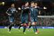 Munich's Toni Kroos, front celebrates his side's opening goal with David Alaba, Javier Martinez and Dante, from left, during a Champions League, round of 16, first leg soccer match between Arsenal and Bayern Munich at the Emirates stadium in London, Wednesday, Feb. 19, 2014 .(AP Photo/Alastair Grant)