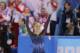 Yulia Lipnitskaya of Russia waves to spectators after competing in the women's team short program figure skating competition at the Iceberg Skating Palace during the 2014 Winter Olympics, Saturday, Feb. 8, 2014, in Sochi, Russia. (AP Photo/Vadim Ghirda)
