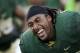 Baylor running back Lache Seastrunk (25) stretches with the team during warm ups before an NCAA college football game against Iowa State, Saturday, Oct. 19, 2013, in Waco, Texas. (AP Photo/Tony Gutierrez)