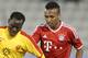 Bayern Munich's Julian Green, right, of Munich and Balla Jabir of Al-Merrikh, challenge for the ball, during their friendly soccer match, at Al-Saad stadium in Doha Thursday, Jan. 9, 2014. (AP Photo/Osama Faisal)