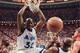 FILE -- Orlando Magic center Shaquille O'Neal (32) hangs onto the rim after a powerful slam dunk during the first quarter fo their Eastern Conference Semifinal game against the Atlanta Hawks May 8, 1996 in Orlando. Defending on the play is Hawks Grant Long (43), left, Horace Grant (54) and Christian Laettner (32) , right. The NBA imposed a lockout Tuesday morning July 9, 1996 after contract talks with the players' union broke down, further delaying the opening of the biggest free agent market in league history. he move halted today's expected free-agent frenzy, with such superstars as O'Neal, Michael Jordan and Reggie Miller up for grabs. (AP Photo/Peter Cosgrove)