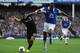 LIVERPOOL, ENGLAND - SEPTEMBER 14: Eden Hazard of Chelsea competes with Sylvain Distin of Everton during the Barclays Premier League match between Everton and Chelsea at Goodison Park on September 14, 2013 in Liverpool, England. (Photo by Chris Brunskill/Getty Images)
