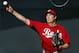 Cincinnati Reds pitcher Homer Bailey throws during spring training baseball practice in Goodyear, Ariz., Saturday, Feb. 15, 2014. (AP Photo/Paul Sancya)