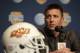 Oklahoma State coach Mike Gundy answers questers from reporters during the AT&T Cotton Bowl Classic media day on Monday, Dec. 30, 2013, in Arlington, Texas. Missouri will play Oklahoma State in the annual bowl game on Friday. (AP Photo/Tim Sharp)