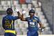 Sri Lanka’s Kumar Sangakkara, right, celebrates with his teammate Angelo Mathews after scoring a century during the second one day international (ODI) cricket match against Bangladesh in Dhaka, Bangladesh, Thursday, Feb. 20, 2014. (AP Photo/A.M. Ahad)