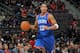 AUBURN HILLS, MI - FEBRUARY 1: Evan Turner #12 of the Philadelphia 76ers handling the ball during a game against the Detroit Pistons on February 1, 2014 at The Palace of Auburn Hills in Auburn Hills, Michigan. NOTE TO USER: User expressly acknowledges and agrees that, by downloading and/or using this photograph, User is consenting to the terms and conditions of the Getty Images License Agreement. Mandatory Copyright Notice: Copyright 2014 NBAE (Photo by Allen Einstein/NBAE via Getty Images)