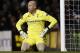 Tottenham Hotspur's goalkeeper Brad Friedel reacts to Basel's Fabian Frei goal during their Europa League quarterfinal first leg soccer match at White Hart Lane, London, Thursday, April 4, 2013. (AP Photo/Matt Dunham)