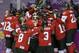 Team Canada celebrates their 3-2 victory over the United States in the women's gold medal ice hockey game at the 2014 Winter Olympics, Thursday, Feb. 20, 2014, in Sochi, Russia. (AP Photo/Petr David Josek)