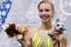 Polina Edmunds of the United States waits in the results area after completing her routine in the women's short program figure skating competition at the Iceberg Skating Palace during the 2014 Winter Olympics, Wednesday, Feb. 19, 2014, in Sochi, Russia. (AP Photo/Bernat Armangue)