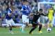 LIVERPOOL, ENGLAND - SEPTEMBER 14: Eden Hazard of Chelsea competes with Leon Osman of Everton during the Barclays Premier League match between Everton and Chelsea at Goodison Park on September 14, 2013 in Liverpool, England. (Photo by Clive Brunskill/Getty Images)