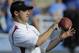 Southern California's assistant coach Steve Sarkisian watches the team warm up before their NCAA college football game against UCLA at the Rose Bowl in Pasadena, Calif., Saturday, Dec. 6, 2008. (AP Photo/Chris Carlson)