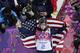 Maddie Bowman of the United States celebrates after winning the gold medal in the women's ski halfpipe final at the Rosa Khutor Extreme Park, at the 2014 Winter Olympics, Thursday, Feb. 20, 2014, in Krasnaya Polyana, Russia. (AP Photo/Andy Wong)