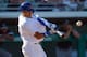 Mar 7, 2013; Mesa, AZ, USA; Chicago Cubs shortstop Javier Baez (70) doubles during the ninth inning against the Chicago White Sox at HoHoKam Park. Mandatory Credit: Jake Roth-USA TODAY Sports