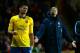 SOUTHAMPTON, ENGLAND - JANUARY 28: Arsene Wenger manager of Arsenal reacts s he looks to Olivier Giroud of Arsenal during the Barclays Premier League match between Southampton and Arsenal at St Mary's Stadium on January 28, 2014 in Southampton, England. (Photo by Mike Hewitt/Getty Images)