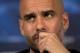Bayern Munich's head coach Pep Guardiola listens to a question during a press conference in London, Tuesday, Feb. 18 ,2014, ahead of their round of 16 Champions League soccer match against Arsenal on Wednesday. (AP Photo/Alastair Grant)