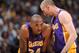 DENVER, CO - MAY 10: Kobe Bryant #24 of the Los Angeles Lakers speaks to teammate Steve Blake #5 while playing against the Denver Nuggets in Game Six of the Western Conference Quarterfinals during the 2012 NBA Playoffs on May 10, 2012 at the Pepsi Center in Denver, Colorado. NOTE TO USER: User expressly acknowledges and agrees that, by downloading and/or using this Photograph, user is consenting to the terms and conditions of the Getty Images License Agreement. Mandatory Copyright Notice: Copyright 2012 NBAE (Photo by Garrett W. Ellwood/NBAE via Getty Images)