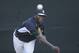 New York Yankees starting pitcher Michael Pineda pitches in the bullpen during spring training baseball practice Monday, Feb. 17, 2014, in Tampa, Fla. (AP Photo/Charlie Neibergall)