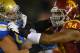 Southern California defensive end Leonard Williams, right, tries to get by UCLA guard Alex Redmond during the first half of an NCAA college football game, Saturday, Nov. 30, 2013, in Los Angeles. (AP Photo/Mark J. Terrill)