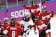 Canada celebrates their 1-0 victory over Team USA in the men's semifinal ice hockey game at the 2014 Winter Olympics, Friday, Feb. 21, 2014, in Sochi, Russia. (AP Photo/Matt Slocum)