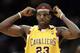 Cleveland Cavaliers' LeBron James (23) adjusts his mask after a timeout in the second quarter against the New York Knicks Saturday, Jan. 8, 2005, in Cleveland. (AP Photo/Tony Dejak)
