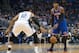 Dec 23, 2013; Orlando, FL, USA; Orlando Magic small forward Tobias Harris (12) defends New York Knicks small forward Carmelo Anthony (7) during the first half of the game at the Amway Center. Mandatory Credit: Rob Foldy-USA TODAY Sports
