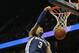 Memphis Grizzlies forward James Johnson (3) dunks as Atlanta Hawks forward Cartier Martin (20) defends during the second half of an NBA basketball game Saturday, Feb. 8, 2014, in Atlanta. Memphis won 79-76. (AP Photo/John Bazemore)