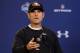 San Francisco 49ers head coach Jim Harbaugh answers a question during a news conference at the NFL football scouting combine in Indianapolis, Thursday, Feb. 20, 2014. (AP Photo/Michael Conroy)