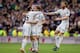 MADRID, SPAIN - FEBRUARY 22: Asier Illarramendi (2ndR) of Real Madrid CF celebrates scoring their opening goal with teammates Daniel Carvajal (L) and Xabi Alonso (R) during the La Liga match between Real Madrid CF and Elche CF at Estadio Santiago Bernabeu on February 22, 2014 in Madrid, Spain. (Photo by Gonzalo Arroyo Moreno/Getty Images)