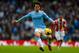 MANCHESTER, ENGLAND - FEBRUARY 22: David Silva of Manchester City in action during the Barclays Premier League match between Manchester City and Stoke City at the Etihad Stadium on February 22, 2014 in Manchester, England. (Photo by Paul Thomas/Getty Images)