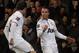 Manchester United's Robin Van Persie, right, celebrates his penalty goal against Crystal Palace with teammate Juan Mata during their English Premier League soccer match at Selhurst Park, London, Saturday, Feb. 22, 2014. (AP Photo/Sang Tan)