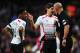 LONDON, ENGLAND - FEBRUARY 16: Raheem Sterling (L) and Steven Gerrard (C) of Liverpool talk with match referee Howard Webb during the FA Cup Fifth Round match between Arsenal and Liverpool at the Emirates Stadium on February 16, 2014 in London, England. (Photo by Shaun Botterill/Getty Images)