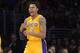 Los Angeles Lakers guard Kent Bazemore celebrates during the second half of an NBA basketball game against the Boston Celtics, Friday, Feb. 21, 2014, in Los Angeles. (AP Photo/Mark J. Terrill)