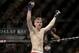 Stephen Thompson celebrates his TKO win over Robert Whittaker following a UFC 170 mixed martial arts welterweight fight on Saturday, Feb. 22, 2014, in Las Vegas. (AP Photo/Isaac Brekken)