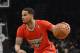 NEW YORK, NY - DECEMBER 25: D.J. Augustin #14 of the Chicago Bulls controls the ball during the second quarter against the Brooklyn Nets at the Barclays Center on December 25, 2013 in the Brooklyn borough of New York City. NOTE TO USER: User expressly acknowledges and agrees that, by downloading and/or using this photograph, user is consenting to the terms and conditions of the Getty Images License Agreement. (Photo by Christopher Pasatieri/Getty Images)