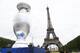 A 12 meters tall replica of the UEFA EURO 2016 trophy, called the Henri Delaunay Cup, displayed in front of the Eiffel Tower in Paris, Monday, June 24, 2013. France will host the UEFA EURO 2016 tournament between June 10 and July 10, 2016. (AP Photo/Michel Euler)