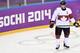 Canada's Sidney Crosby takes part in a warm-up ahead of quarterfinal hockey action against Latvia at the 2014 Sochi Winter Olympics in Sochi, Russia on Wednesday, Feb. 19, 2014. (AP Photo/The Canadian Press, Nathan Denette)