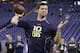 Alabama quarterback AJ McCarron throws during a drill at the NFL football scouting combine in Indianapolis, Sunday, Feb. 23, 2014. (AP Photo/Michael Conroy)
