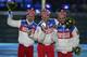 From left, Russia's silver medal winner Maxim Vylegzhanin, Russia's gold medal winner Alexander Legkov and Russia's bronze medal winner Ilia Chernousov pose during the medals ceremony for the men's 50K cross-country race during the closing ceremony of the 2014 Winter Olympics, Sunday, Feb. 23, 2014, in Sochi, Russia. (AP Photo/Charlie Riedel)