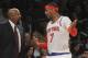 New York Knicks head coach Mike Woodson, left, speaks to Carmelo Anthony during the second half of Game 2 of their NBA basketball playoff series against the Indiana Pacers in the Eastern Conference semifinals Tuesday, May 7, 2013, at Madison Square Garden in New York. The Knicks won 105-79. (AP Photo/Mary Altaffer)