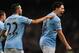 Manchester City's Samir Nasri, right, celebrates after scoring against Chelsea, with teammate Gael Clichy, left, during the English FA Cup fifth round soccer match between Manchester City and Chelsea at The Etihad Stadium, Manchester, England, Saturday, Feb. 15, 2014. (AP Photo/Rui Vieira)