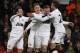 Manchester United's Wayne Rooney, second right, celebrates his goal against Crystal Palace with teammates during their English Premier League soccer match at Selhurst Park, London, Saturday, Feb. 22, 2014. (AP Photo/Sang Tan)