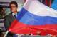 Russia's national football team head coach Fabio Capello attends the TV show where 2018 Soccer World Cup host cities were announced, late Saturday, Sept. 29, 2012, in Moscow, Russia. Slogan reads