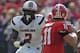 Georgia quarterback Aaron Murray (11) works under pressure from South Carolina defensive end Jadeveon Clowney (7) during the first half of an NCAA football game, Saturday, Sept. 7, 2013, in Athens, Ga. (AP Photo/Mike Stewart)