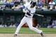 Seattle Mariners' Nick Franklin homers against the Minnesota Twins in the fourth inning of a baseball game Sunday, July 28, 2013, in Seattle. (AP Photo/Elaine Thompson)