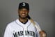 This is a 2014 photo of infielder Robinson Cano of the Seattle Mariners baseball team. This image reflects the Mariners active roster as of Thursday, Feb. 20, 2014, when this image was taken. (AP Photo/Tony Gutierrez)