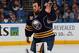 BUFFALO, NY - FEBRUARY 05: Ryan Miller #30 of the Buffalo Sabres waves to fans as he receives his USA Olympic jersey before a game against the Pittsburgh Penguins on February 5, 2014 at the First Niagara Center in Buffalo, New York. (Photo by Bill Wippert/NHLI via Getty Images)