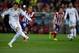 MADRID, SPAIN - FEBRUARY 11: Cristiano Ronaldo of Real Madrid CF scores their opening goal from a penalty shot during the Copa del Rey semi-final second leg match between Club Atletico de Madrid and Real Madrid CF at Vicente Calderon Stadium on February 11, 2014 in Madrid, Spain. (Photo by Gonzalo Arroyo Moreno/Getty Images)