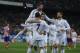 Real's Cristiano Ronaldo, center no. 7, celebrates his goal with teammates during a semifinal, 2nd leg, Copa del Rey soccer match between Atletico de Madrid and Real Madrid at the Vicente Calderon stadium in Madrid, Spain, Tuesday Feb. 11, 2014. (AP Photo/Andres Kudacki)