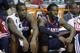 Paul Millsap and DeMarre Carroll on the bench